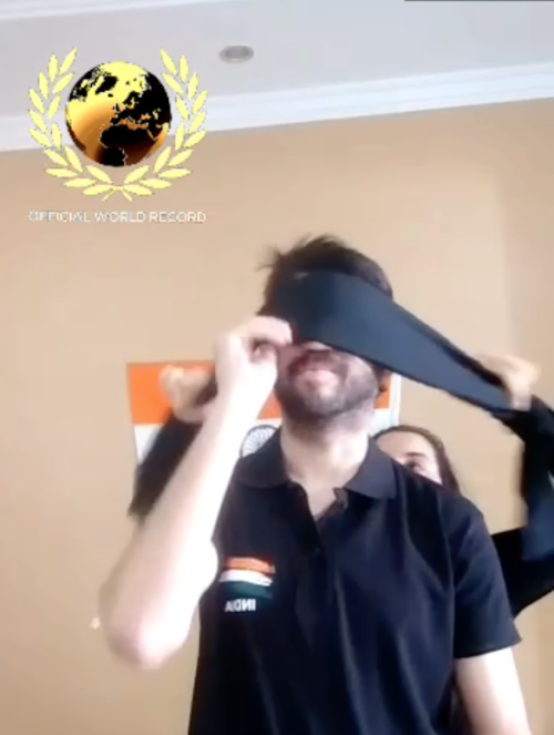Most number of spins in a minute using 2 nunchuks simultaneously and being blind-folded (392)