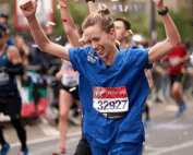 THE WOMAN WHO HAS FINISHED A MARATHON FASTEST DRESSED IN THE NURSE'S UNIFORM